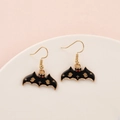 Halloween bat drop earrings with black enamel, gold trim and red eye accents - Halloween Bat
