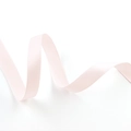 Close-up of a 1.5cm wide light pink double-sided satin ribbon with a glossy texture - Satin / Light Pink