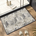 Modern chenille doormat with geometric diamond patterns and gray border on wooden floor - Crystal Rhombus