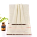 Thick cotton face towel with colored stripes and water ripple texture in cream white - Beige Stripe