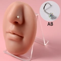 S-shaped surgical steel nose screw featuring a sparkling AB color crystal ball top - 0.8x7x3mm / S-Shape AB Iridescent