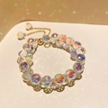Bracelet en perles irisées avec pendentifs cœur dorés et chaîne ajustable - Style de Cœur Irisé en Acrylique