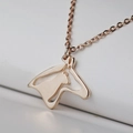 Rose gold necklace featuring a cutout horse head pendant with a cat silhouette inside - Horse Head and Cat / Rose Gold