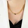 Double-layer gold chain necklace with a black rectangular zircon pendant on a model - Gold Color Black Zirconia Necklace