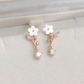 Macro shot of rose gold flower earrings with colorful zircons and shell petals - 28# 25277 Rose Gold Colorful Zircon Flower