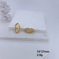 Macro detail of gold lip earrings with zircon stones showing 14 by 27mm dimensions - Gold Lip