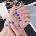 Detailed close-up of blue French tip coffin press-on nails with a high gloss finish - Glue Type / Royal Blue French (CBLFS-06)