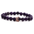 Purple faceted beaded bracelet with a rose gold crown charm on a white background - Purple Faceted Beads
