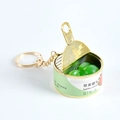 Llavero miniatura de conserva de manzana con trozos verdes y anillo de metal - Estilo Manzana - Llavero Dorado