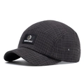 Short brim baseball cap in dark grey plaid with a black rectangular logo patch - Black
