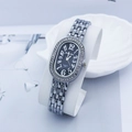 Detailed macro view of the silver chain strap and rhinestone bezel on this quartz watch - Silver Black