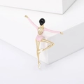 Elegant gold ballet dancer brooch with pink enamel on a white geometric display - Ballet Girl / Pink