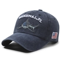 Washed navy blue baseball cap featuring detailed shark embroidery and American flag patch - Adjustable / Navy Blue