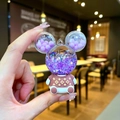 Cartoon crystal bear keychain with purple moving sand and clover pattern details - Purple