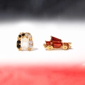 Detail view of gold-plated arch and vintage car earrings with zircon stones - Arch and Vintage Car