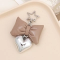 Brown padded leather bow keychain with a metallic silver heart pendant on a star clasp - Coffee Star Clasp (K3613)