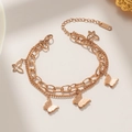 Double-layered rose gold titanium steel bracelet with elegant butterfly pendants - Rose Gold