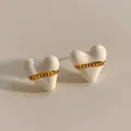 Minimalist 316 stainless steel heart stud earrings with cream enamel and gold chain detail - White