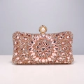 Sparkling champagne pink evening clutch bag featuring rhinestone patterns and pearl clasp - Champagne