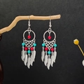 Bohemian silver dreamcatcher earrings with turquoise beads and feather pendants - Colorful