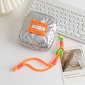 Silver puffer mini bag with butterfly embossing and contrasting orange knot lanyard - Bow Embossed Silver (Orange Label)