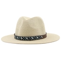 Detail of bohemian hand-woven beads and leather band on a straw sun hat for women - Beige