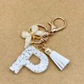Letter P resin keychain with white fragments, gold butterfly charm and white tassel - Letter P