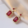 Elegant gold earrings with rectangular red zircons and crystals on silk fabric - Ruby Red Earrings