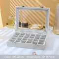 Beigefarbene 24-Gitter-Schmuckschatulle mit Glasdeckel und Metallschloss, 20x15x5cm - Beige