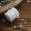 5M Christmas transparent snowflake bead chain on white spool for holiday decoration - Transparent Snowflake Beads / 5m