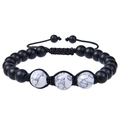 Detailed close-up of matte black beads and white turquoise on adjustable braided bracelet - White Howlite Bracelet