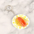 Miniature food keychain featuring realistic braised meat and sauce on a spiral plate - Mini Pig Trotter - Keychain