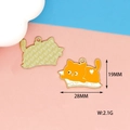 Cute orange reading cat enamel charm for DIY jewelry and keychains, 19mm by 28mm - Cat Lying on Book
