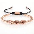 Rose gold beaded bracelet featuring square charms with black cubic zirconia accents - Rose Gold Geometric Cube