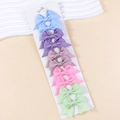 Set of 10 colorful grosgrain ribbon bow hair clips for baby girls on a white card - Style 36