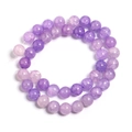 Detailed macro shot of purple crackle glass beads for DIY jewelry and accessory crafts - Light Purple Floral Round Bead