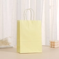 Light yellow gift paper bag with matching handles on a minimalist aesthetic background - 15*11*6cm / Macaron Yellow