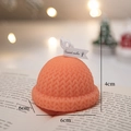 Orange knitted hat shaped scented candle with realistic yarn texture for Xmas decor - Orange Hat - Wild Orange Blossom