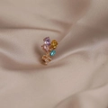Elegant gold brooch featuring colorful teardrop crystals and a sparkling diamond butterfly - Balloon #519