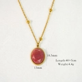 Detail view of gold beaded chain necklace with pink oval stone and product dimensions - Beaded Oval Style (XB2401004-3)