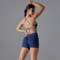 Detailed back view of navy blue ribbed yoga set featuring scrunch butt lifting shorts - S / Dark Blue