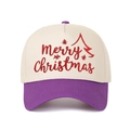 Detail of embroidered Christmas tree and Merry Christmas text on a retro trucker cap - Purple