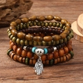 Handmade multilayer wood bead bracelets set with silver Hamsa hand charm and turquoise beads - Hamsa Hand 5-piece Set