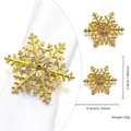 Detailed view of a golden snowflake napkin ring with rhinestones and size measurements - Gold Snowflake Style 44