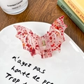 Gothic bat wing hair claw in translucent pink acrylic with festive red glitter flakes - 8.5cm / Ribbon Red