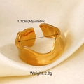 Detailed view of an irregular wavy gold ring showing adjustable size and metal texture - Gold Irregular Style