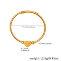 Detailed view of flexible gold stainless steel wire bracelet with smooth heart pendant - Z006-Gold Bracelet / Gold