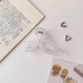 Frosted bow hair claw and silver heart stud earrings set on decorative background - 11cm / Frosted Bow White