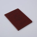 Brown PU leather passport holder with embossed United States of America seal and text - Brown