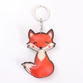 Cute red PU leather fox keychain with stuffed cotton and durable metal ring on white background - Fox